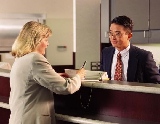 Airport money exchange bank teller