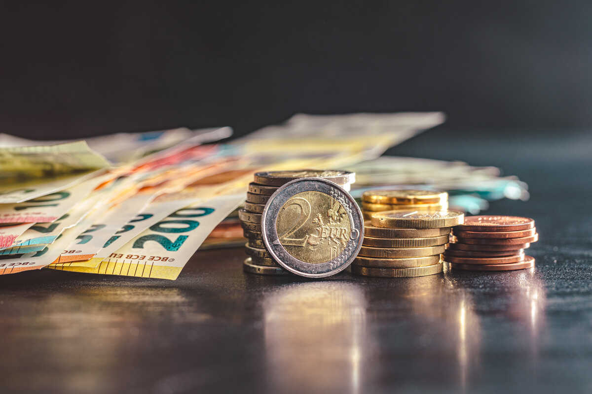 euro coins on paper euro banknot