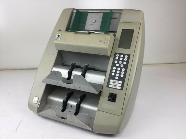 De La Rue machine for counting and verifying Iraqi Dinar.