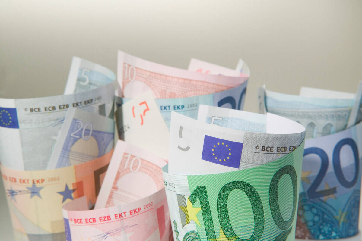rolled euro currency bills