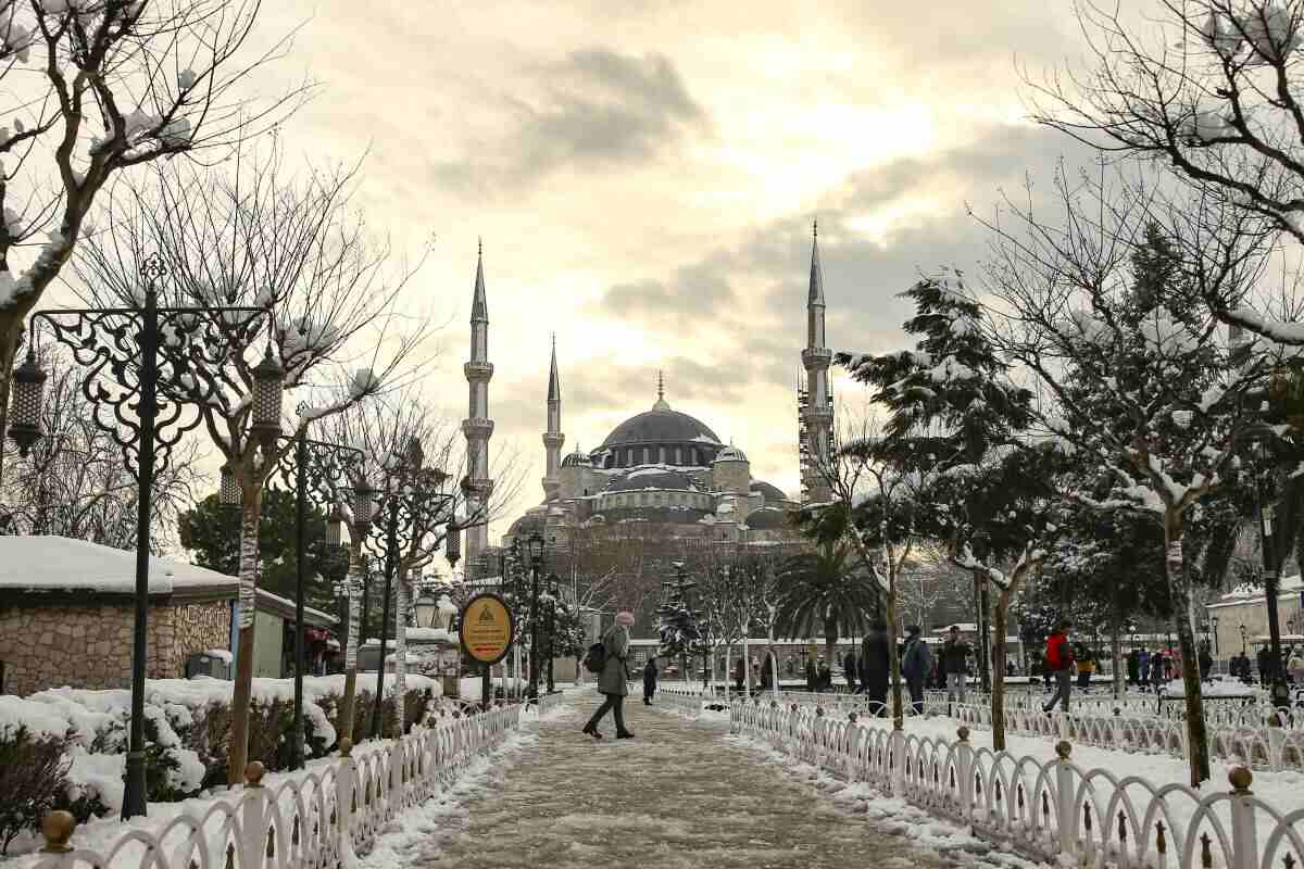 Winter view of the Blue Mosque in Istanbul, with snow-covered pathway